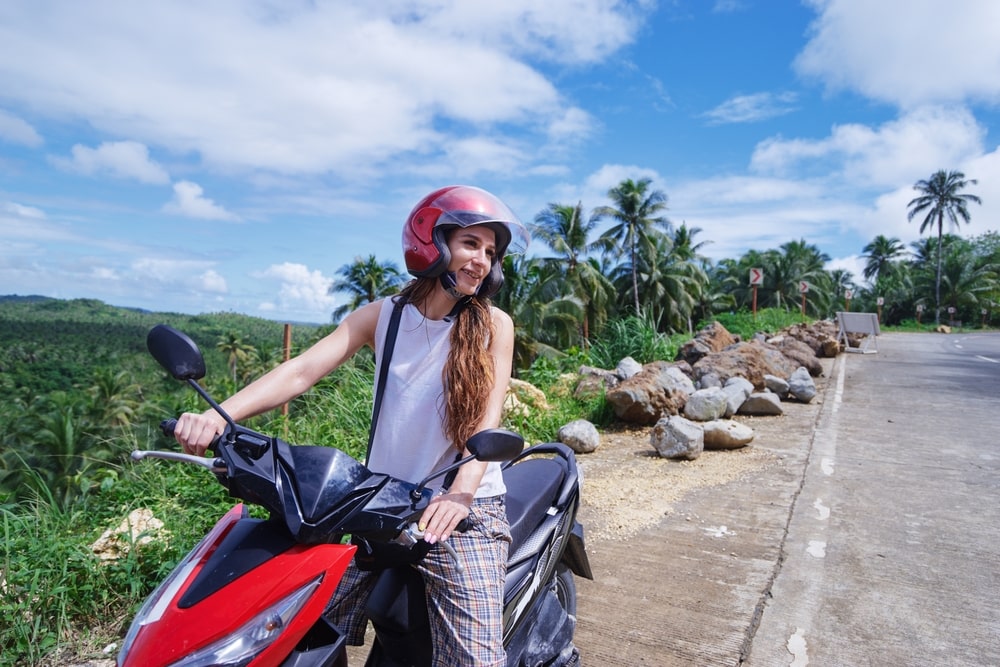 a girl on a motobike in vietnam